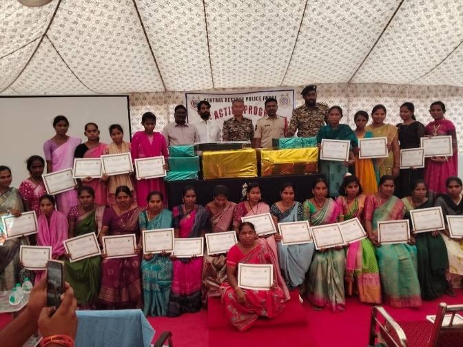 Women participants receiving programme certificates
